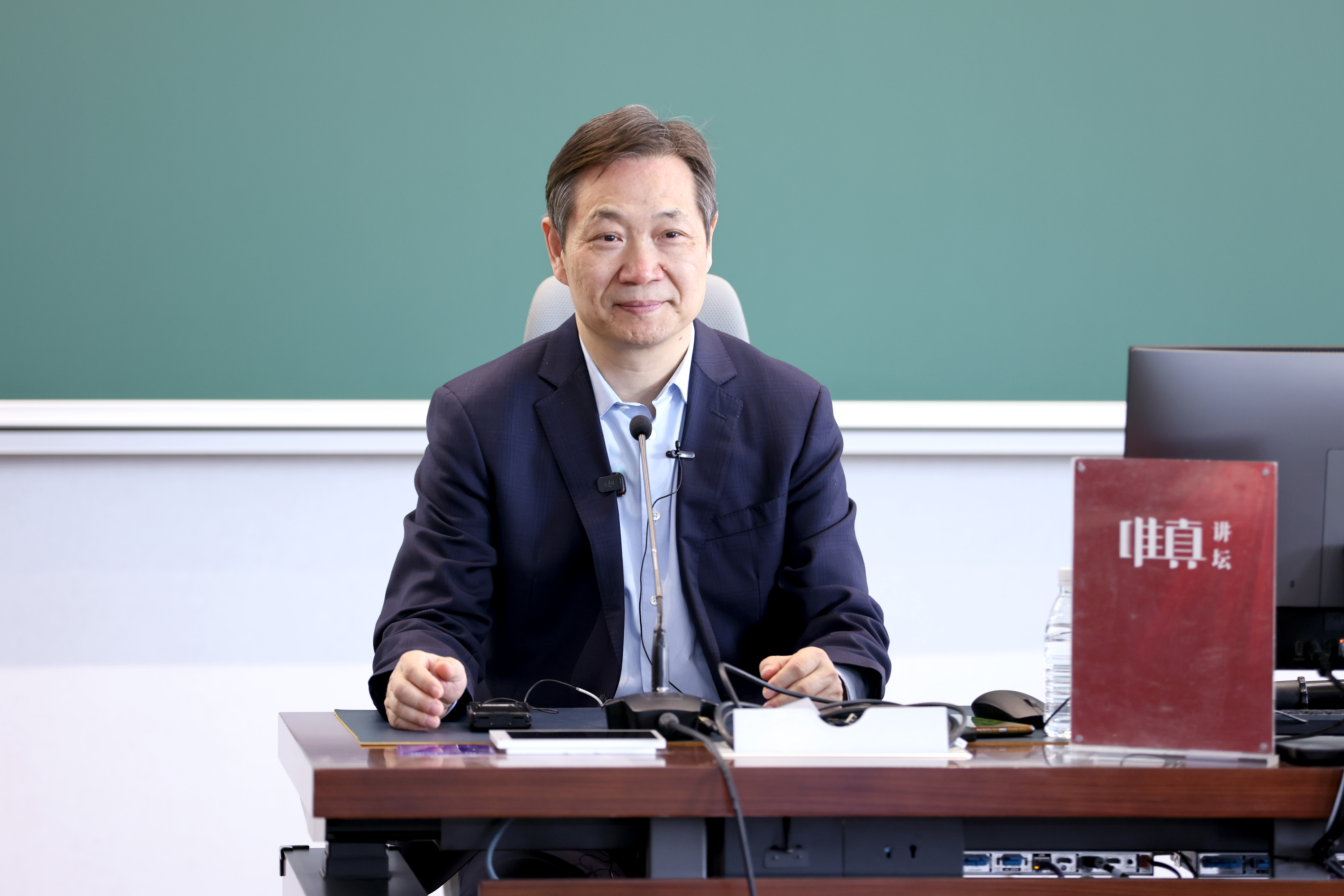 20260327-唯真讲坛-石加东-王传利作报告-.JPG
